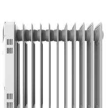 Radiateur bain d’huile 360º Ready Warm 5720 Space White. 11 éléments, faible consommation, 2500 W, 3 niveaux de puissance, protection contre la surchauffe et le renversement, roues et jusqu'à 20 m² de surface couverte.