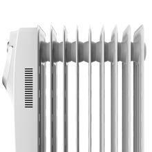 Radiateur bain d’huile Ready Warm 5800 Space 360º White. 9 éléments, faible consommation, 2000 W, 3 niveaux de puissance, protection contre la surchauffe et le renversement, roues, 20 m²