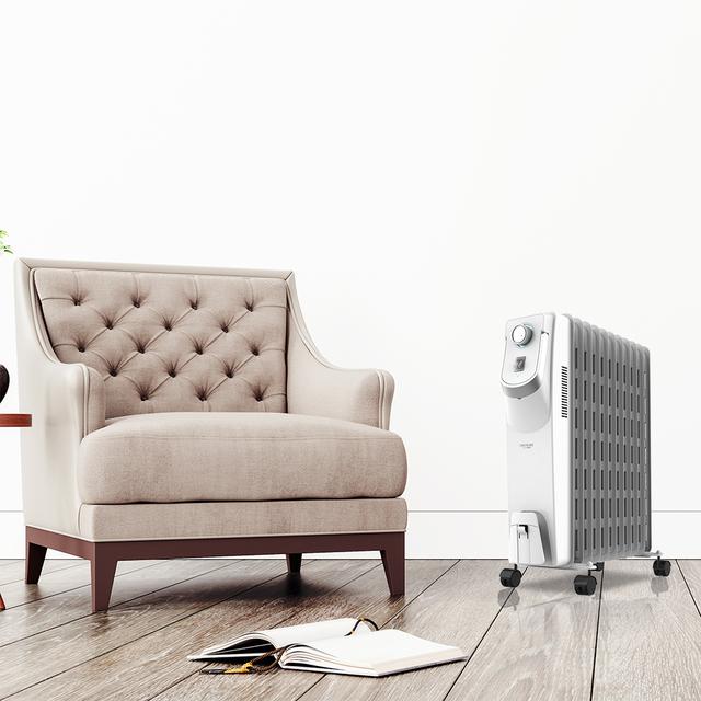 Radiateur bain d’huile Ready Warm 5850 Space 360º White. 11 éléments, faible consommation, 2500 W, 3 niveaux de puissance, protection contre la surchauffe et le renversement, roues et jusqu'à 25 m² de surface couverte.