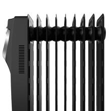 Radiateur bain d’huile Ready Warm 5820 Space 360º Black. 9 éléments, faible consommation, 2000 W, 3 niveaux de puissance, protection contre la surchauffe et le renversement, roues, 20 m²