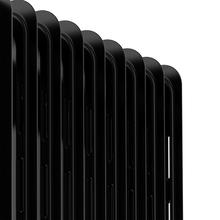 Radiateur bain d’huile Ready Warm 5820 Space 360º Black. 9 éléments, faible consommation, 2000 W, 3 niveaux de puissance, protection contre la surchauffe et le renversement, roues, 20 m²