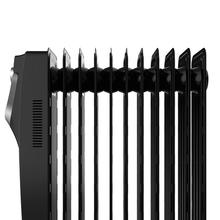 Radiateur bain d’huile Ready Warm 5850 Space 360º Black. 11 éléments, faible consommation, 2500 W, 3 niveaux de puissance, protection contre la surchauffe et le renversement, roues, 25 m²