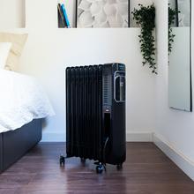 Radiateur bain d’huile ReadyWarm 9000 Touch Connected Black. Faible consommation, 9 éléments, 2000 W, contrôle via app, 3 modes de fonctionnement, écran LCD, tactile, minuterie, 20 m² de surface couverte