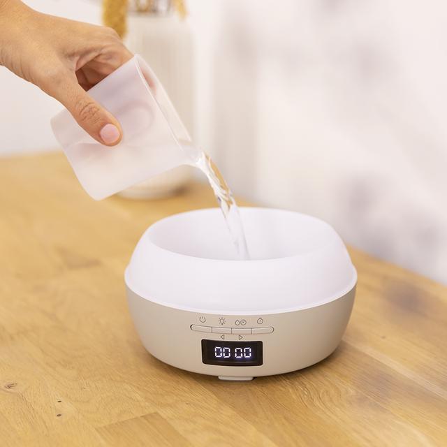 Diffuseur d’arômes PureAroma 550 Connected Sand. 500 ml de capacité, écran LED, haut-parleur, contrôle via Bluetooth, app, minuterie 12 h, 3 modes de fonctionnement, 30 m² de surface couverte