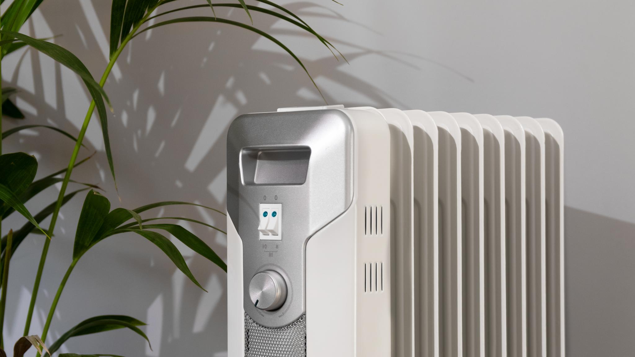 Thermostat réglable avec 3 niveaux de puissance.
