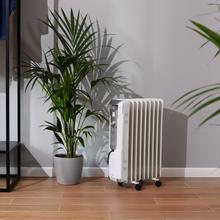 Radiateur bain d’huile ReadyWarm 9000 Space. 9 éléments, faible consommation, 2000 W, 3 niveaux de puissance, ramasse-câbles, système de sécurité, roues, 20 m² de surface couverte.