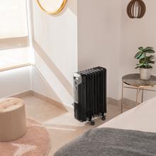 Radiateur bain d’huile ReadyWarm 9000 Space Black. 9 éléments, faible consommation, 2000 W, 3 niveaux de puissance, ramasse-câbles, système de sécurité, roues, 20 m² de surface couverte.