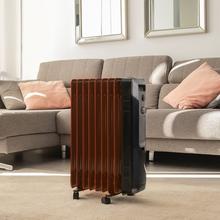 Radiateur bain d’huile ReadyWarm 9000 Space Black. 9 éléments, faible consommation, 2000 W, 3 niveaux de puissance, ramasse-câbles, système de sécurité, roues, 20 m² de surface couverte.