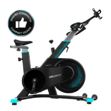 DrumFit Indoor 7000 Magno. Bicicleta Estática con Resistencia Magnética, Diseño Compacto, Silenciosa, Sillín y Manillar deportivos, Ergonómica, Pantalla LCD, Portabotellas