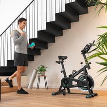 Cyclette da casa DrumFit Indoor 6000 Forcis con volano da 6 kg, resistenza manuale, monitor LCD, supporto per dispositivi, borraccia, portaborraccia e fermapiede.