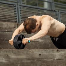 DrumFit AB Wheel Ruota per addominali per allenare il core e gli addominali. Rivestimento in gomma sulla parte esterna per una migliore presa e stabilità. Con impugnature imbottite e antiscivolo. Tappetino in gomma EVA incluso.