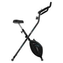 Vélo d'appartement pliable Drumfit X-Bike 3000 Neo. Écran LCD. Volant d'inertie de 3 Kg. Résistance magnétique variable. Selle confort. Support tablette et roulettes de transport.