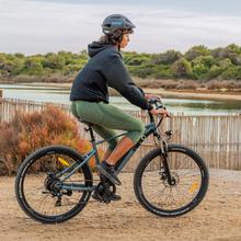 Bicicleta de montanha elétrica MTB de bateria amovível com 55 km de autonomia, 27,5", suspensão dianteira, caixa de velocidades shimano de 21 velocidades e travões de disco duplo.