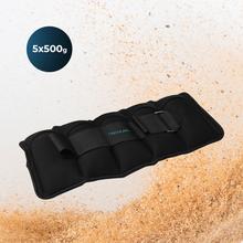 Drumfit AnkleBell 2500 Neo Set di 2 pesi per caviglia e polso con cinturini in velcro regolabili. Peso regolabile da 0,5 kg a 2,5 kg. Include 5 sacchetti da 500 g. Pieno di sabbia.