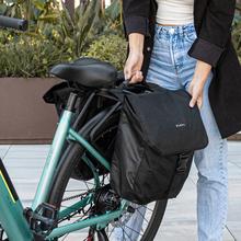 City Woman Bici elettrica da città con autonomia di 90 km, sospensione anteriore, cambio shimano a 7 velocità e doppio freno a disco.