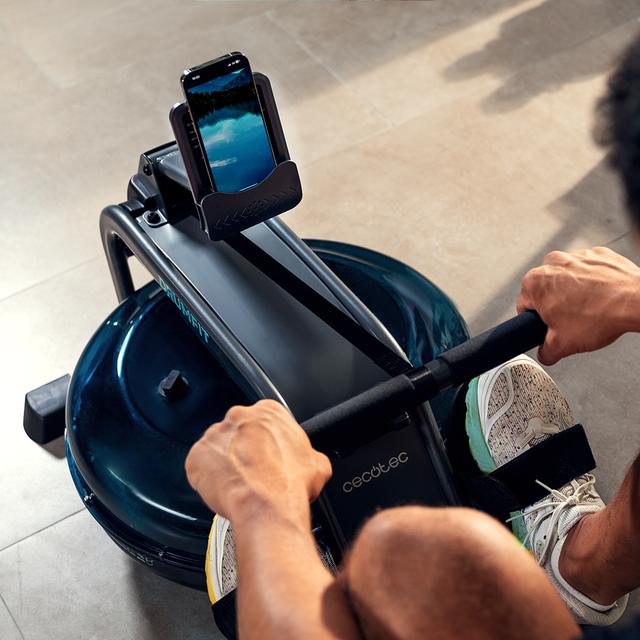 Drumfit Rower 10000 Neptuno Máquina de remo de resistencia de agua con tanque de 13 litros de capacidad. Sillín ajustable horizontalmente. Pantalla LCD. Soporte para dispositivos. Peso máximo de 135 kg y altura máxima 190 cm.