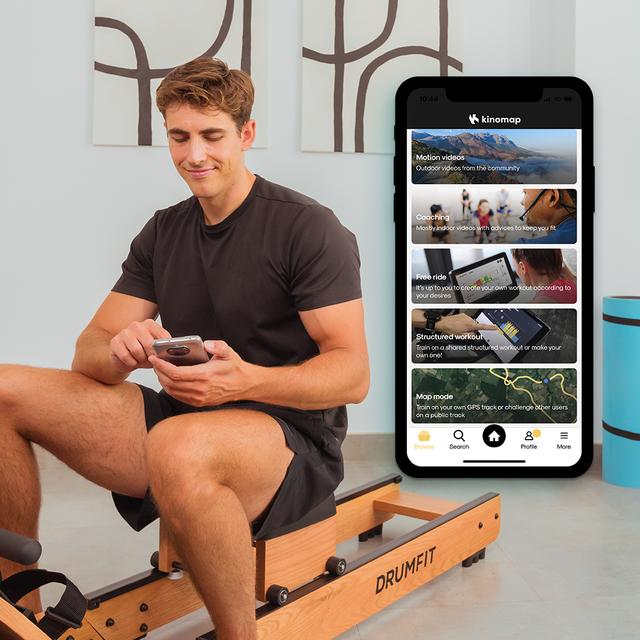 Drumfit Rower 20000 Neptuno Wood Rudergerät mit Wasserwiderstand und Holzoberfläche. Tank mit 13 Liter Fassungsvermögen. APP. Horizontal verstellbarer Sattel. LCD-Display. Display-Halterung. Doppelter Lenker. Maximales Gewicht 135 kg und maximale Größe 195 cm.