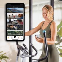 Drumfit Elliptical 8000 Motor Pro Ellittica con resistenza magnetica regolabile a motore. APP. Pieghevole. Display LCD con supporto per dispositivi. Volano inerziale da 8 kg. Cardiofrequenzimetro. Passo di 40 cm. Peso massimo 110 kg e altezza massima 190 cm.