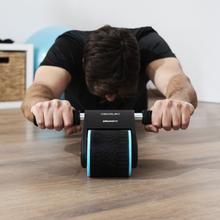 Drumfit AB Fit Abdominalrad mit automatischer Rückfederung. Kompaktes Design. 10cm breit. Licht. Rutschfeste und gepolsterte Matte. Maximales Benutzergewicht 100 kg.