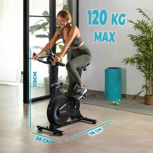 DrumFit Indoor 10000 Race Cyclette spinning professionale con volano inerziale da 10 kg. Display LCD. Supporto per dispositivi. Cardiofrequenzimetro. Ruote di trasporto. Resistenza di attrito. Sellino regolabile in verticale e orizzontale. Peso massimo 120 kg e altezza massima 180 cm.