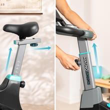 Bicicleta interna DrumFit Indoor 10000 MagnoMotor Connected com sistema de resistência magnética. Resistência motorizada. APLICATIVO. Volante de 10 Kg. Suporte ao dispositivo. Rodas de transporte. Pulsômetro. Peso máximo 120 kg e altura máxima 190 cm.