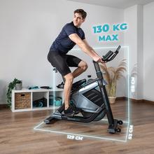 DrumFit Indoor 15000 Magnetic Connected Bicicleta de interior com sistema de resistência magnética ajustável. APP. Volante de inércia de 15 kg. Ecrã LCD. Suporte para dispositivo e porta-garrafas. Monitor cardíaco. Selim de gel confortável.