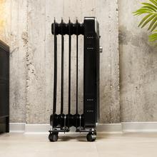 Radiateur bain d’huile Ready Warm 5000 Space Black   avec 5 éléments, 1000 W et 3 niveaux de puissance.