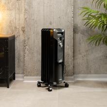 Radiateur bain d’huile Ready Warm 5000 Space Black   avec 5 éléments, 1000 W et 3 niveaux de puissance.