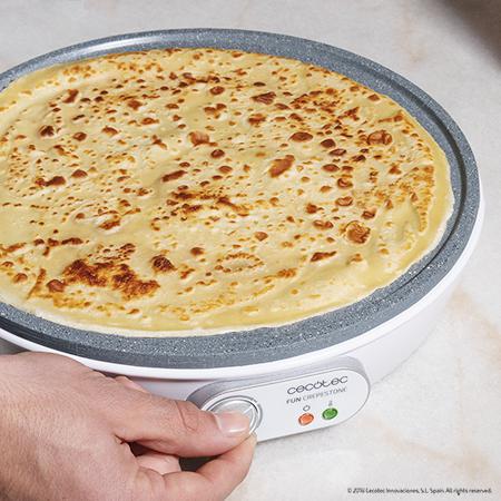 Crêpière Fun Crepestone. 1000 W, plaque réversible avec revêtement antiadhésif RockStone, thermostat réglable, répartiteur de pâte et spatule, témoin lumineux, 30,5 cm