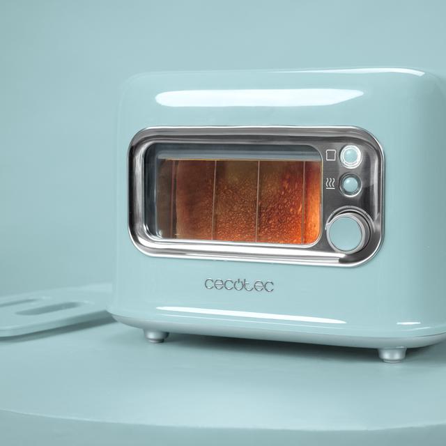 RetroVision Blue Toaster mit Glasfensterwand und Retro-Design. Kurze Schlitze mit Platz für zwei breite Toastscheiben. Inklusive Staubschutzhülle. 700 W Leistung und 5 Röststufen.