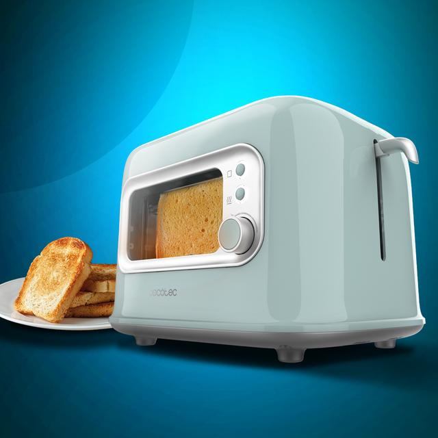 Grille-pain bleu RetroVision avec paroi vitrée et design rétro. Fentes courtes pouvant accueillir deux toasts larges. Comprend un cache-poussière. 700 W de puissance et 5 niveaux de grillage.