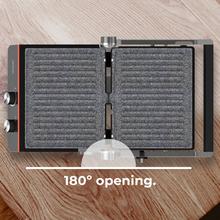 Grill électrique Rock'nGrill Blaze Neon 2200 W qui règle le temps et la température, possède des plaques amovibles avec revêtement RockStone, va au lave-vaisselle et ouverture à 180º.