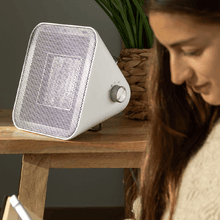 ReadyWarm 1500 Max Ceramic Design Branco Aquecedor de mesa em cerâmica com 1500 W, termóstato ajustável e 3 modos de funcionamento.