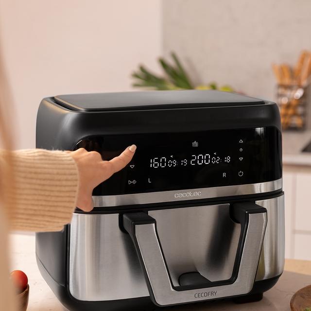 Cecofry Dual 9000 Ölfreie Fritteuse Airfryer 9 L digitale und kompakte ölfreie Fritteuse mit 9 L Fassungsvermögen, PerfectCook-Technologie und mobiler Trennwand zur Auswahl zwischen zwei Körben mit doppelter Temperatur oder einem einzigen Eimer.