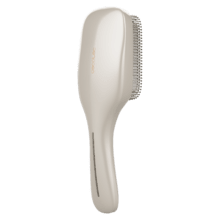 HairCare Revitalize Champagne Brosse réparatrice capillaire avec 5 technologies : vibration, ions négatifs, microcourants EMS, laser basse puissance (LLLT) et lumière LED rouge et bleue. Remplacez votre brosse conventionnelle et aidez à régénérer les cuticules des cheveux.