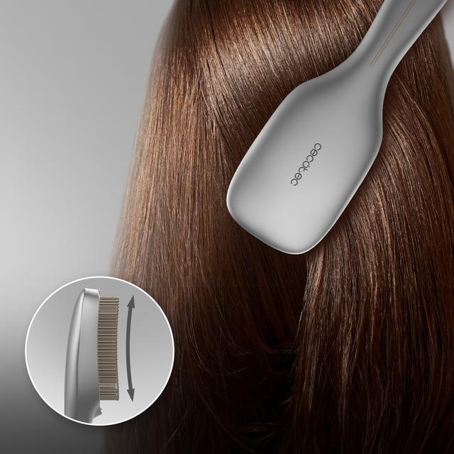 HairCare Revitalize Haarreparaturbürste aus Aluminium mit 5 Technologien: Vibration, negative Ionen, EMS-Mikroströme, Low-Power-Laser (LLLT) sowie rotes und blaues LED-Licht. Ersetzen Sie Ihre herkömmliche Bürste und helfen Sie dabei, die Haarkutikula zu regenerieren.