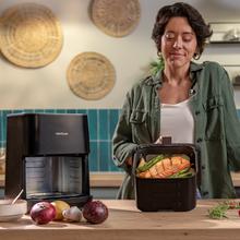 Cecofry&Grill Duoheat 4000 Friggitrice ad aria con doppia resistenza per una doratura perfetta e sapore di barbecue sulla carne, capacità di 4 litri e potenza di 1900 W per piatti salutari.