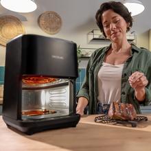 Cecofry&Grill Duoheat 4000 Friggitrice ad aria con doppia resistenza per una doratura perfetta e sapore di barbecue sulla carne, capacità di 4 litri e potenza di 1900 W per piatti salutari.