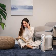 ReadyWarm 900 Space White ReadyWarm 900 Space White Radiatore elettrico ad olio a 9 Moduli, basso consumo energetico, 1000 W, sistema di sicurezza, 15 m2