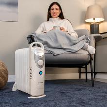 ReadyWarm 900 Space White ReadyWarm 900 Space White Radiatore elettrico ad olio a 9 Moduli, basso consumo energetico, 1000 W, sistema di sicurezza, 15 m2