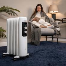 ReadyWarm 950 Space White. Radiador Eléctrico de Aceite con 9 Módulos, Bajo Consumo, 2000 W, 3 Niveles de potencia, Sistema de Seguridad, Ruedas 20 m2