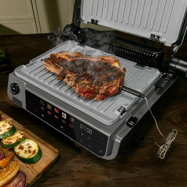 Rock'nGrill 2000 Smash PerfectCook Griglia elettrica da 2000 W con tecnologia Smokeless, che regola il tempo e la temperatura in funzione della modalità e il punto di cottura selezionati, piastre estraibili con rivestimento RockStone lavabili in lavastoviglie e apertura 180º.