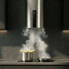 Bolero Flux DRT 358000 Inox A++ Hotte aspirante murale ronde de 35 cm de diamètre, aspiration jusqu’à 715 m3/h, finition inox, classe A++, moteur DC, contrôle tactile, filtres à charbon inclus.