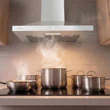 Bolero Flux PT 504400 Inox A+++ Campana Extractora Piramidal de 50cm, con 449,5m³/h de succión, Clase A+++, Control Táctil Invisible, Acabado en Acero Inoxidable y frontal cristal blanco, Motor DC, Hand Movement Control, Función Booster, Filtros Lavables, Opción de filtros de carbono incluídos para recirculación.