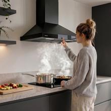 Bolero Flux PT 704400 Inox A+++ Hotte aspirante pyramidale , 70 cm, avec une puissance d'aspiration de 449,5 m³/h, classe A+++, contrôle tactile invisible, finition en acier inoxydable et façade en verre blanc, moteur DC, Hand Movement Control, fonction Booster, filtres lavables, option filtres à charbon inclus pour la recirculation.