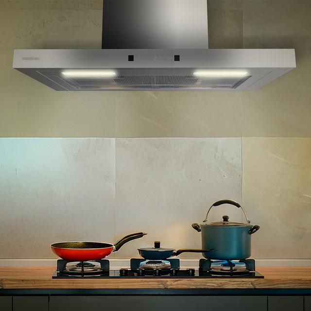 Bolero Flux TT 604400 Inox A++ Hotte aspirante en T, 60 cm, avec une puissance d'aspiration de 413,3 m³/h, classe A++, contrôle tactile invisible, finition en acier inoxydable et façade en verre blanc, moteur BLDC, Hand Movement Control, fonction Booster, filtres lavables, option filtres à charbon inclus pour la recirculation.