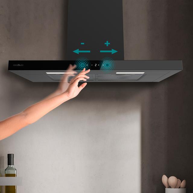 Bolero Flux TT 704400 Inox A++ Hotte aspirante en T, 70 cm, avec une puissance d'aspiration de 413,3 m³/h, classe A++, contrôle tactile invisible, finition en acier inoxydable et façade en verre blanc, moteur BLDC, Hand Movement Control, fonction Booster, filtres lavables, option filtres à charbon inclus pour la recirculation.