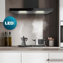 Bolero Flux TT 704400 Inox A++ Hotte aspirante en T, 70 cm, avec une puissance d'aspiration de 413,3 m³/h, classe A++, contrôle tactile invisible, finition en acier inoxydable et façade en verre blanc, moteur BLDC, Hand Movement Control, fonction Booster, filtres lavables, option filtres à charbon inclus pour la recirculation.