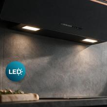 Bolero Flux DT 907500 Matt Black A+++ Cecotec Campana Extractora Decorativa de 90cm en Cristal negro Mate y Brillante con detalles en color cobre, Chimenea negra, con 717,2m³/h de succión, Clase A+++, Motor BLDC, Control Táctil, Hand Movement Control, Doble Función Booster, Función Air Cleanning, Wifi para utilizar con App, Luz LED, Filtros de aluminio, Opción de filtros de carbono incluídos.
