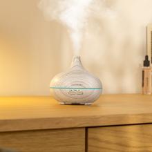 Pure Aroma 150 Yang White Humidificador ultrasónico con difusor de aromas, depósito de hasta 150 ml y 7 colores LED.